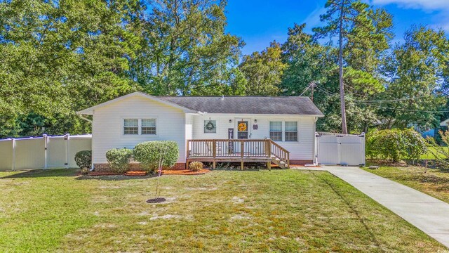 view of front of property with a front lawn