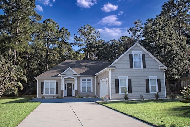 view of front facade featuring concrete driveway, a front lawn, and a garage