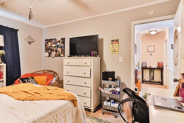 bedroom featuring a textured ceiling and crown molding