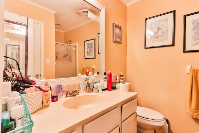 bathroom featuring ornamental molding, a textured ceiling, vanity, toilet, and curtained shower