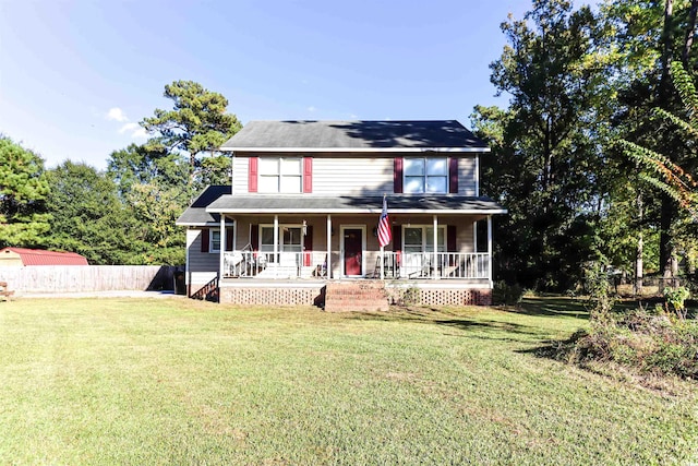 colonial home with a front lawn and a porch