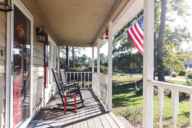 deck featuring covered porch