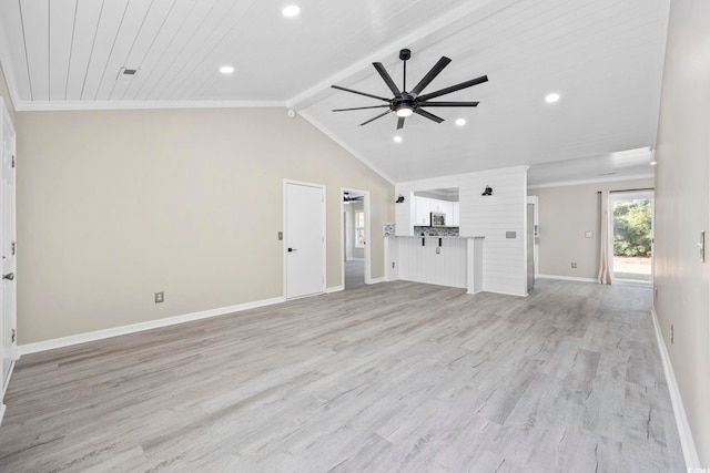 unfurnished living room featuring lofted ceiling with beams, light hardwood / wood-style floors, crown molding, and ceiling fan