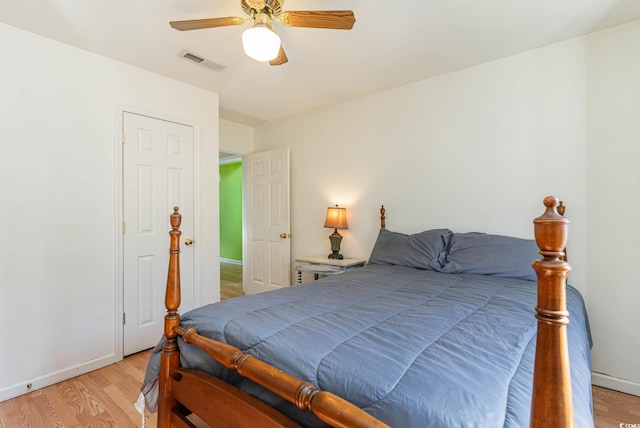 bedroom featuring light wood-type flooring and ceiling fan