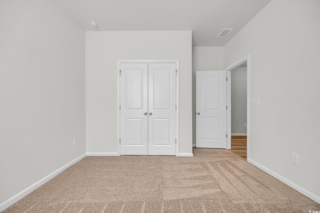 389 Sun Colony Blvd, Longs, SC 29568 - unfurnished bedroom with carpet floors and a closet