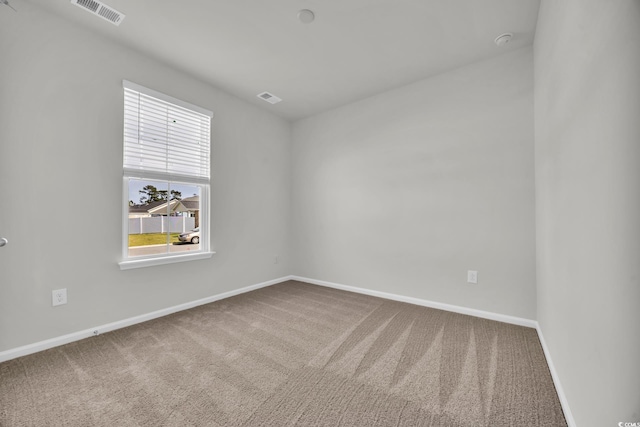389 Sun Colony Blvd, Longs, SC 29568 - spare room with carpet floors and a smoke detector
