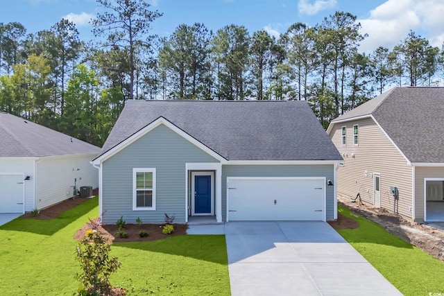 389 Sun Colony Blvd, Longs, SC 29568 - view of front of home featuring a garage, concrete driveway, a front lawn, and roof with shingles