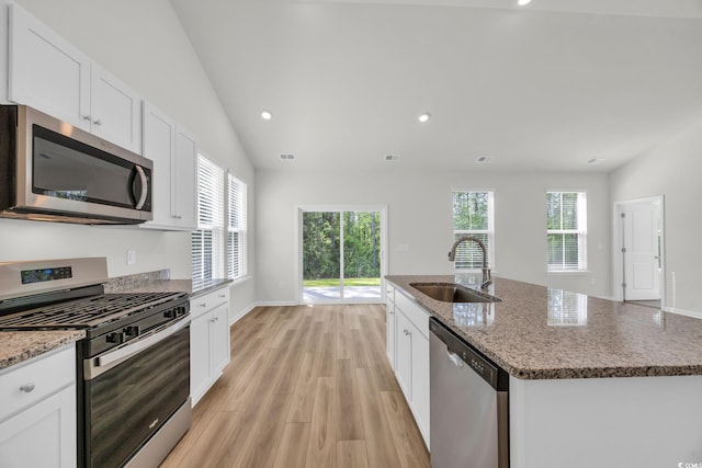 389 Sun Colony Blvd, Longs, SC 29568 - kitchen featuring stainless steel appliances, light wood-style flooring, plenty of natural light, white cabinetry, and recessed lighting