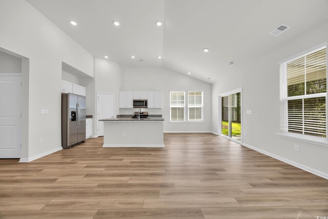 389 Sun Colony Blvd, Longs, SC 29568 - kitchen with appliances with stainless steel finishes, open floor plan, plenty of natural light, white cabinetry, and recessed lighting