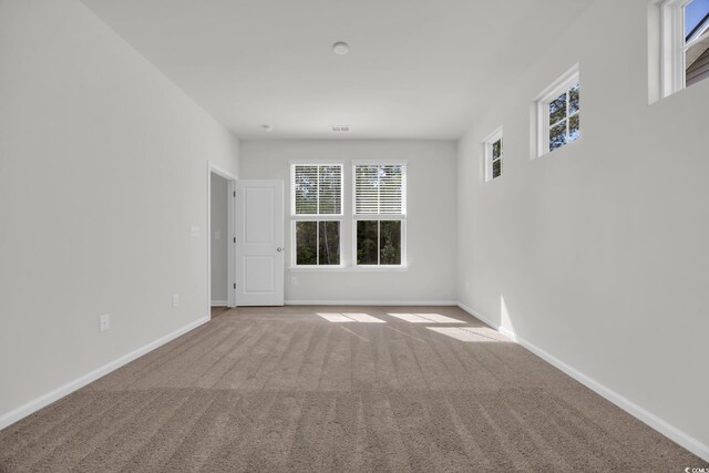 389 Sun Colony Blvd, Longs, SC 29568 - empty room featuring carpet flooring and baseboards