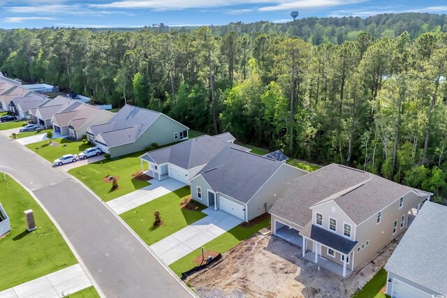 389 Sun Colony Blvd, Longs, SC 29568 - aerial perspective of suburban area featuring a heavily wooded area