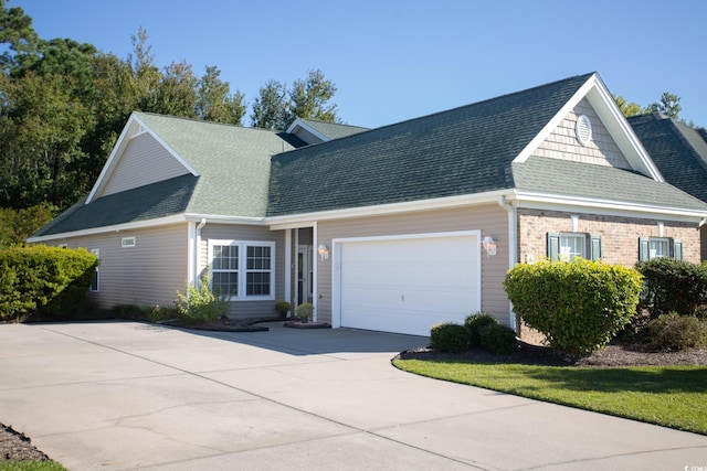 view of side of home featuring a garage