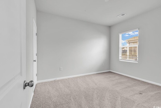 view of carpeted spare room