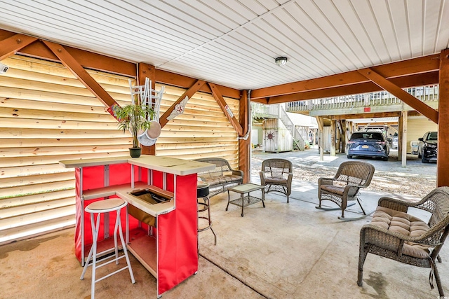 view of patio / terrace featuring an outdoor bar