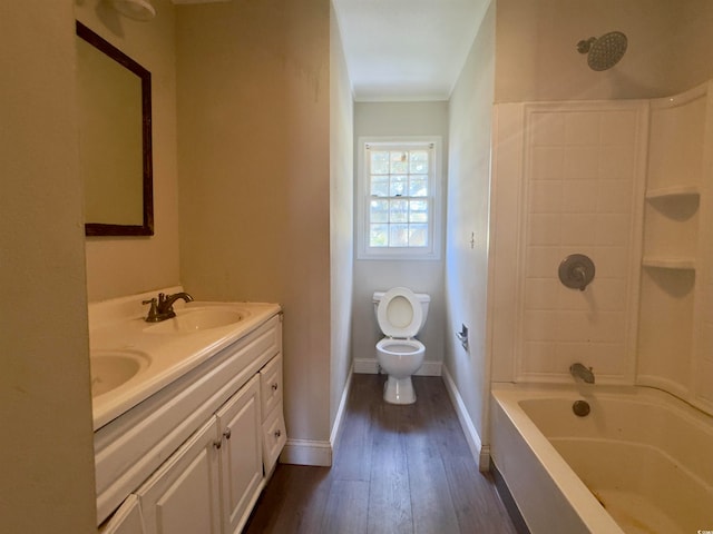 full bathroom with shower / bathtub combination, toilet, vanity, and hardwood / wood-style floors