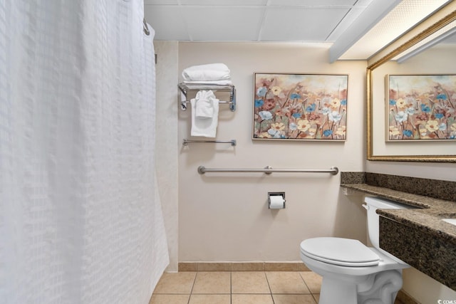 bathroom with toilet, walk in shower, and tile patterned flooring