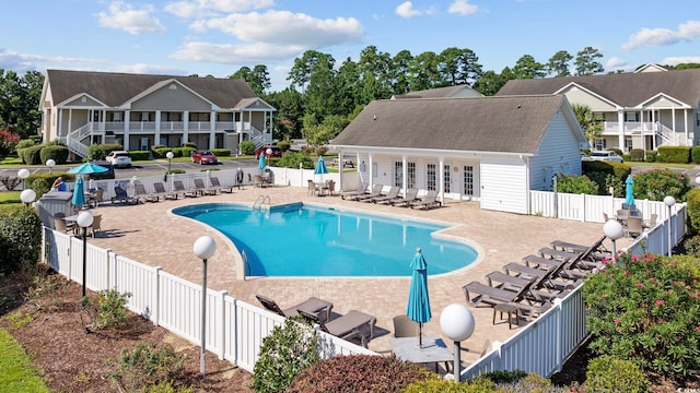 view of swimming pool featuring a patio