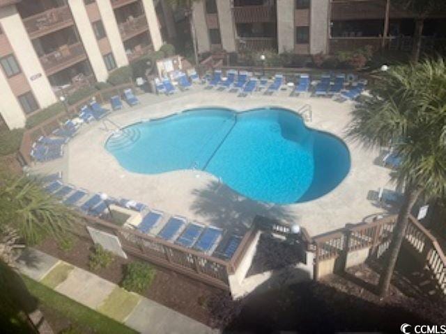 view of pool featuring a patio area