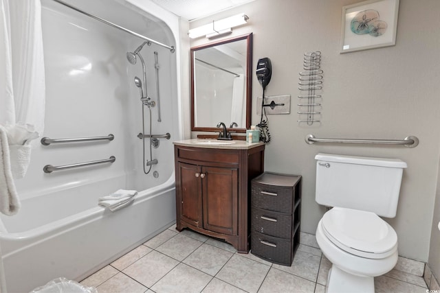 full bathroom with toilet, vanity, tile patterned floors, and bathtub / shower combination