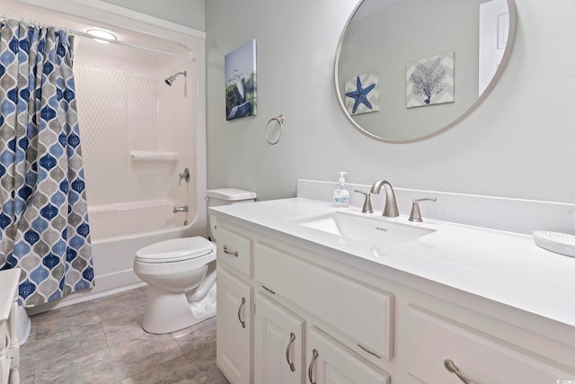 full bathroom with vanity, shower / bath combination with curtain, and toilet