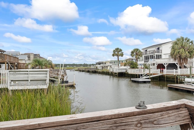 dock area with a deck with water view