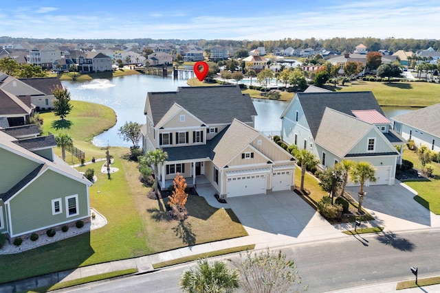 drone / aerial view with a water view