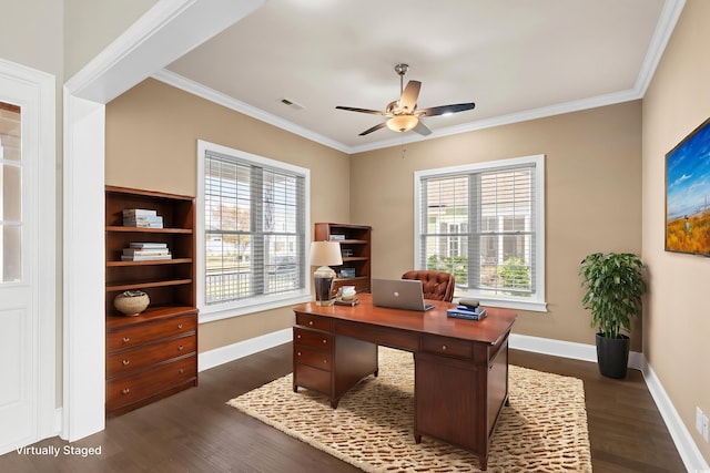 home office with plenty of natural light, crown molding, and dark hardwood / wood-style floors