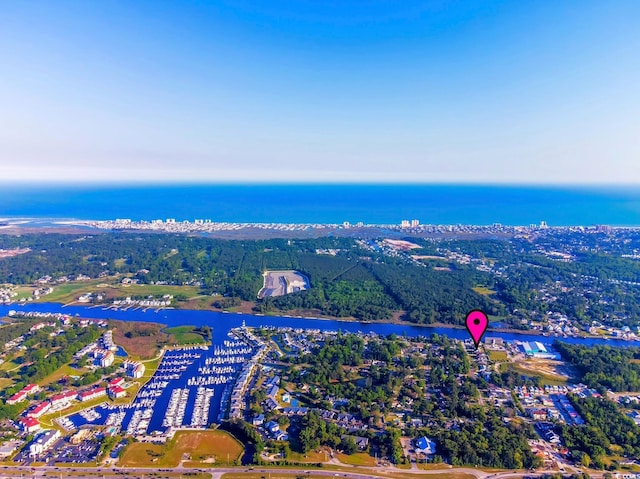 birds eye view of property featuring a water view