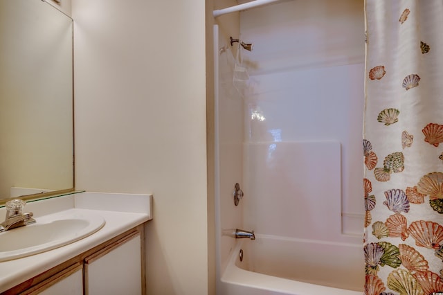 bathroom with vanity and shower / bath combination with curtain