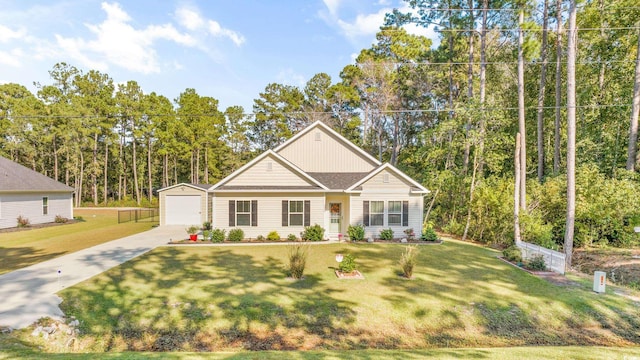 view of front of property featuring a front yard, a garage, and covered porch