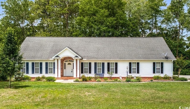 244 George Washington Trl, Georgetown, SC 29440 - view of front of property featuring a front yard and a shingled roof