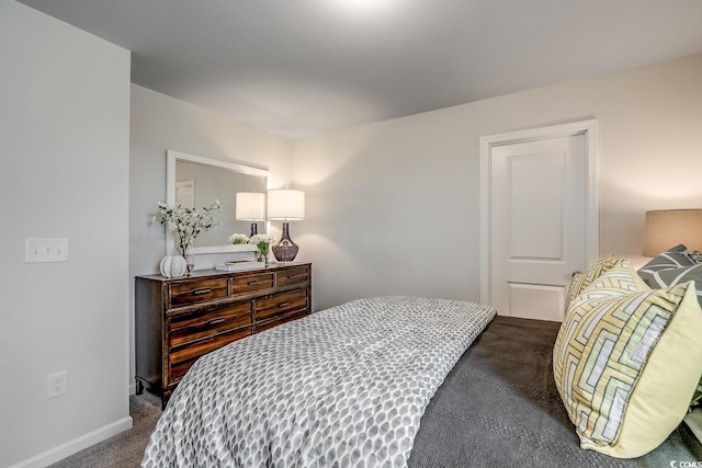 bedroom featuring light carpet