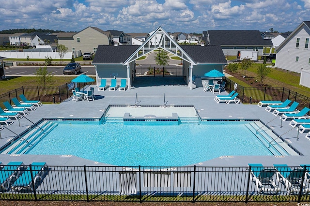 view of swimming pool featuring a patio