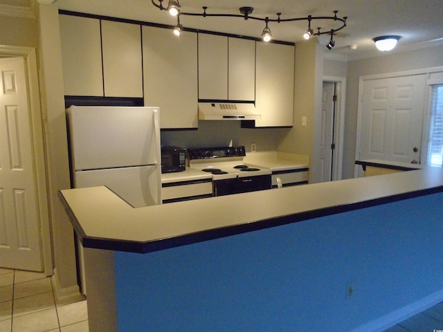 kitchen featuring ornamental molding, white fridge, light tile patterned floors, and electric range