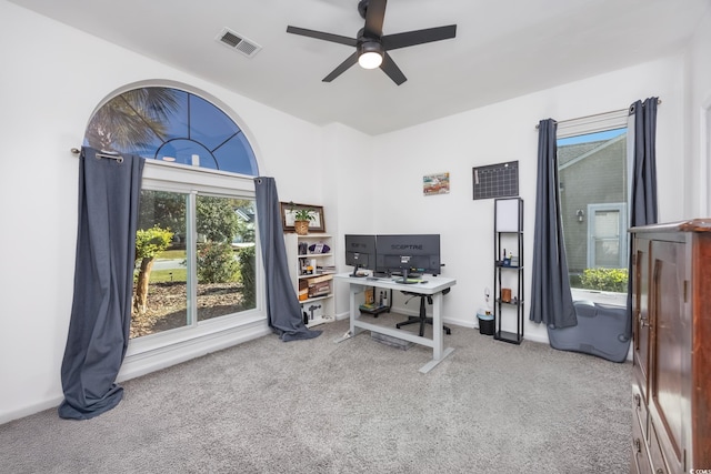 home office with carpet floors and ceiling fan