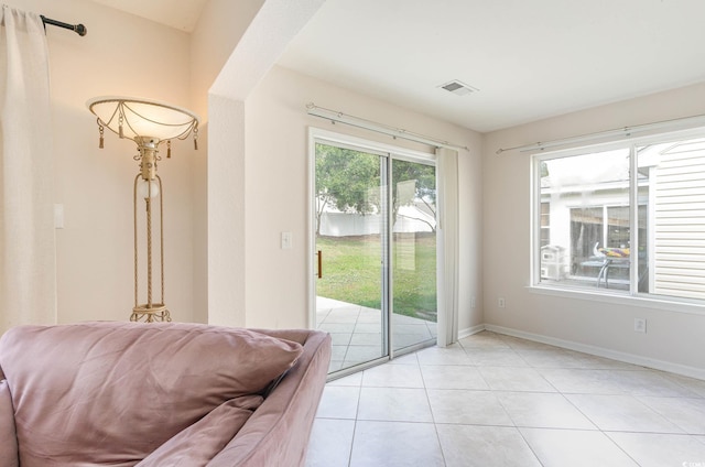 entryway featuring light tile patterned floors