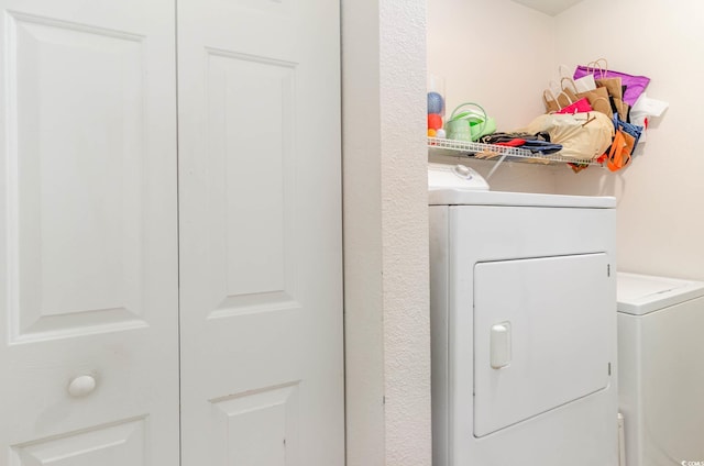 laundry area with washer and dryer