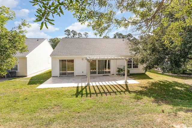 back of property with a lawn, a pergola, and a patio