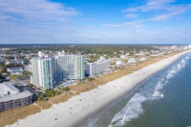 aerial view featuring a water view and a beach view