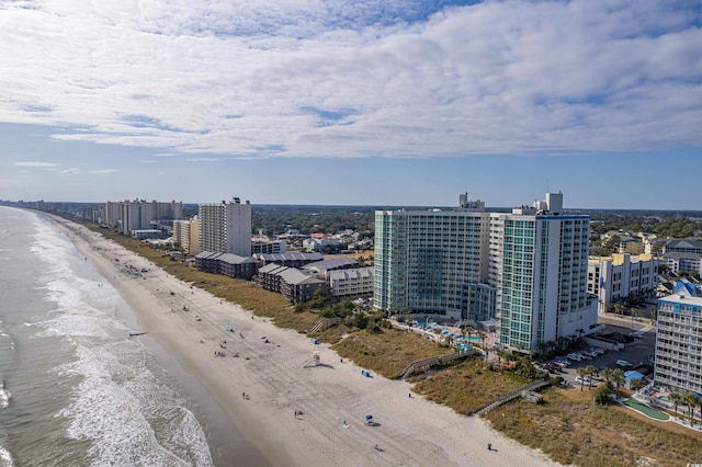 aerial view with a view of the beach and a water view