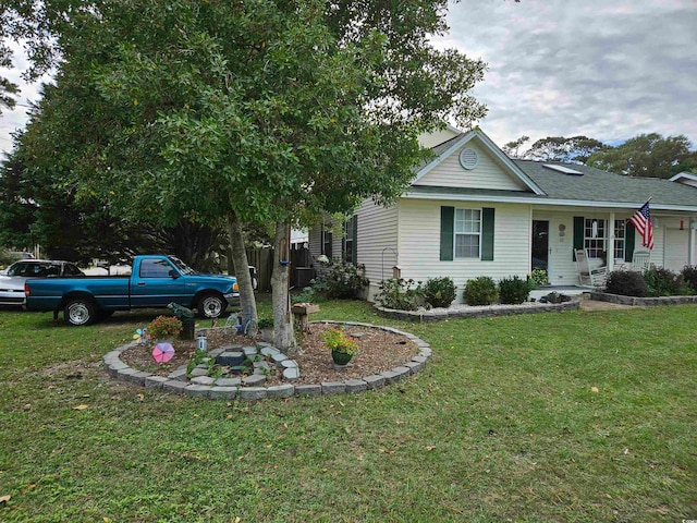 view of front of property with a front yard