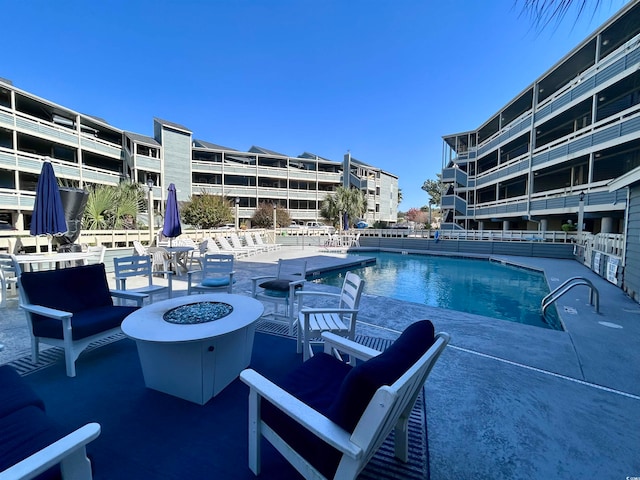 view of pool with a patio area