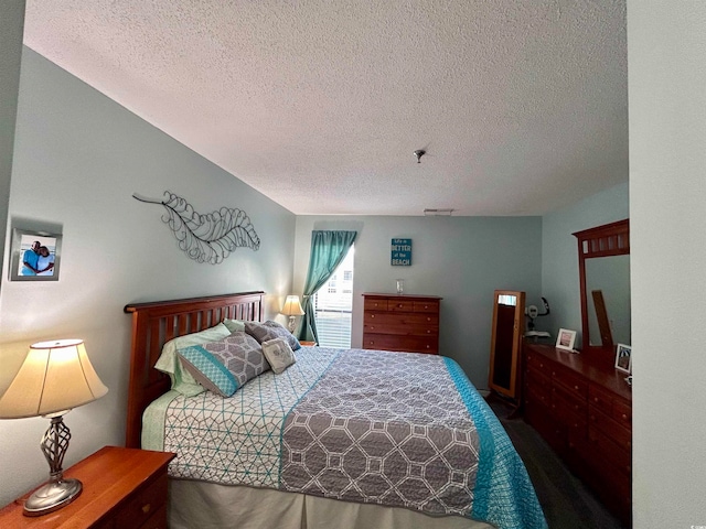 bedroom with a textured ceiling