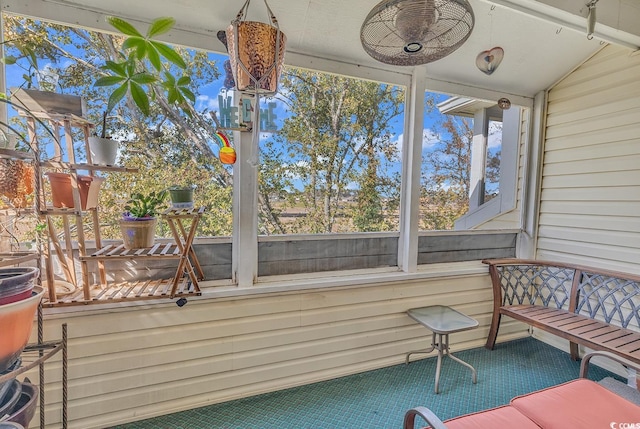 sunroom / solarium with lofted ceiling