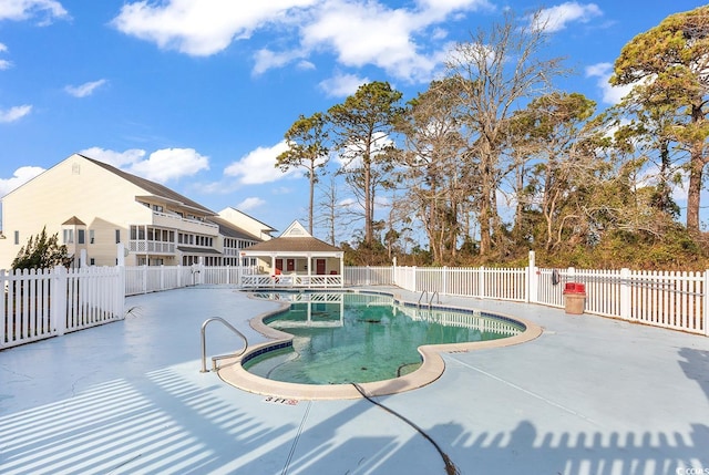 view of pool featuring a patio