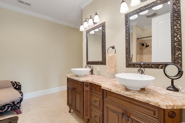 bathroom with vanity, crown molding, tile patterned floors, and walk in shower