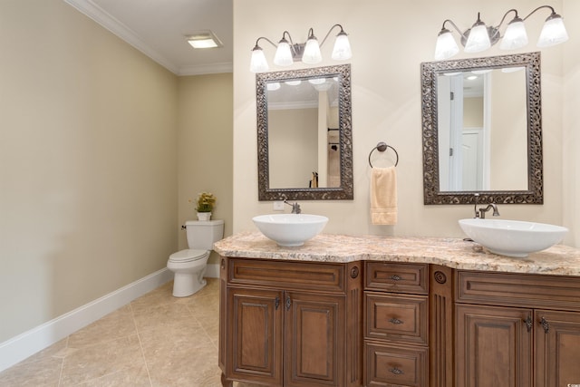 bathroom featuring vanity, crown molding, and toilet