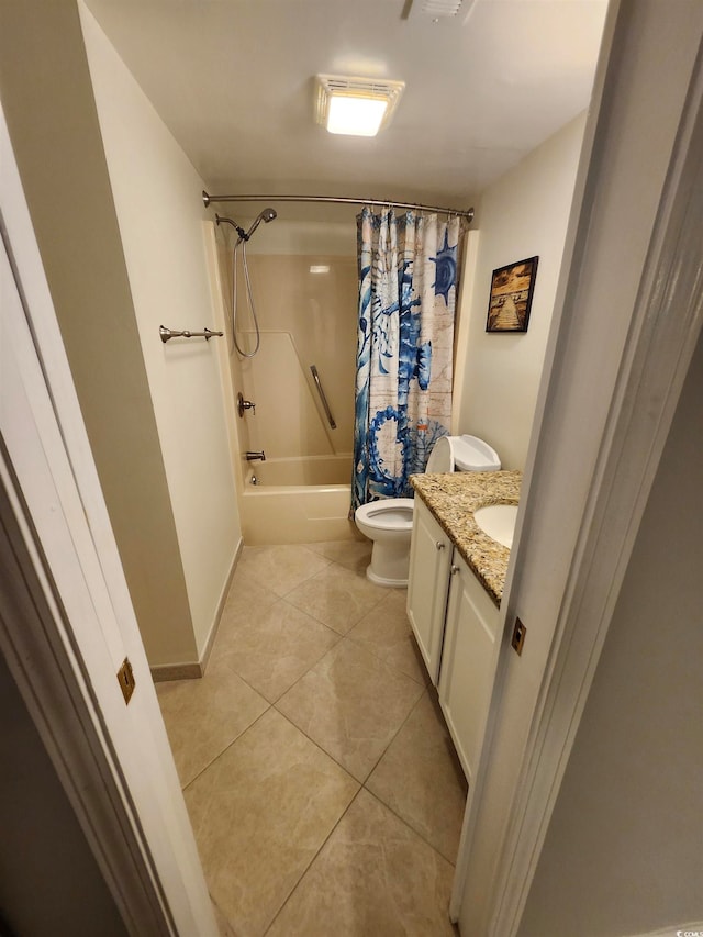 full bathroom featuring toilet, shower / bath combo with shower curtain, vanity, and tile patterned flooring