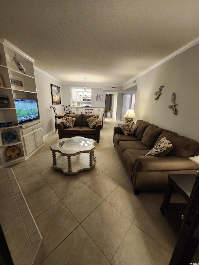 311 69th Ave N Unit 104, Myrtle Beach, SC 29572 - tiled living room featuring an inviting chandelier, a textured ceiling, and ornamental molding