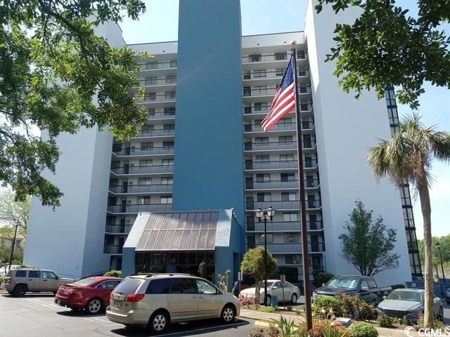 311 69th Ave N Unit 104, Myrtle Beach, SC 29572 - view of property with uncovered parking